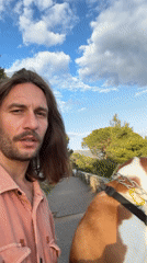 Man takes selfie on stone pathway in Petrovac, Montenegro