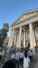 Tourist documents evening walk through Sofia's historic landmarks