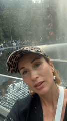 Woman films at Jewel Changi Airport's waterfall Singapore