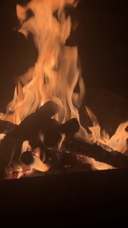 Evening campfire gathering documented in Tomilino, Russia