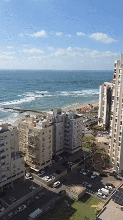 Crowded beach day observed in Bat Yam, Israel