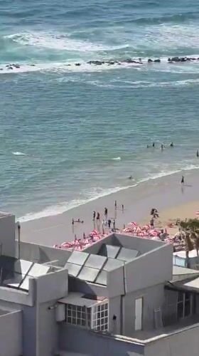 Crowded beach day observed in Bat Yam, Israel