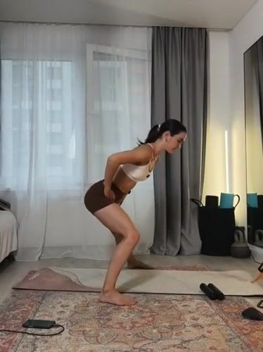 Home workout session filmed on a mat in Tyumen