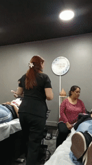 Beauty training session demonstrates techniques to multiple students