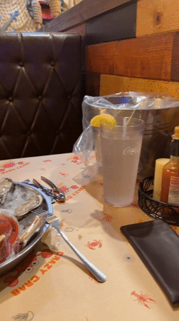 Seafood restaurant with nautical decor and a loaded table