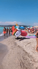 Crowded summer beach day at Vada, Tuscany