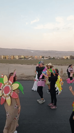 Colorful costumed parade rolls through the streets of Arica
