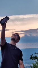 Men take sunset selfies at Bulgarian historical site