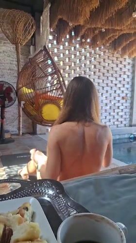 Lazy villa morning in Kuta Selatan — pool, coffee, rattan chairs