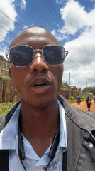 Man takes selfies on dirt road in Nyeri