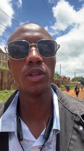 Man takes selfies on dirt road in Nyeri