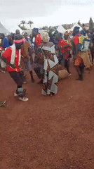 Traditional dance celebration observed with mixed cultural attire