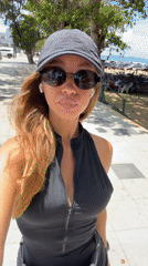 Woman walks beachside path in early morning Pattaya