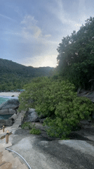 Woman explores Haad Rin Beach during Thailand morning visit