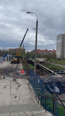 Construction crane operates at Samara building site