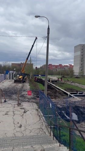 Construction crane operates at Samara building site