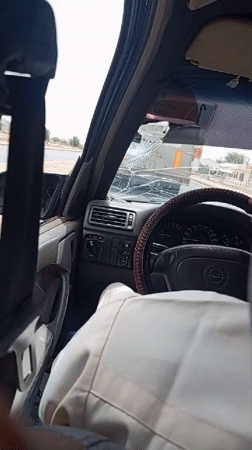 Driver observes tanker truck through cracked windshield in Bauchi