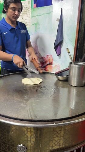 Food preparation observed at Lahore cooking station Saturday afternoon