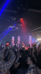 Nightclub performance draws dancing crowd in Moscow