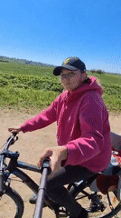 Cyclist records selfie while riding in Kaporskoe, Russia