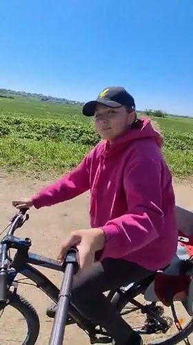 Cyclist records selfie while riding in Kaporskoe, Russia
