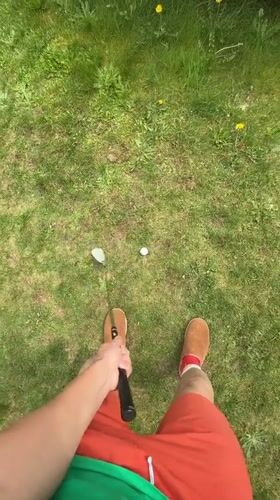 Golf practice and sleeping cat observed in Coquitlam
