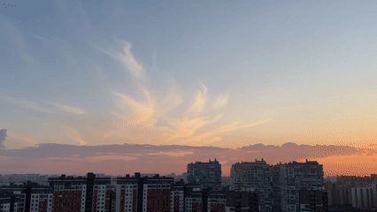 Sunset cityscapes, a Mazda RX-7 diecast, and Baby Yoda