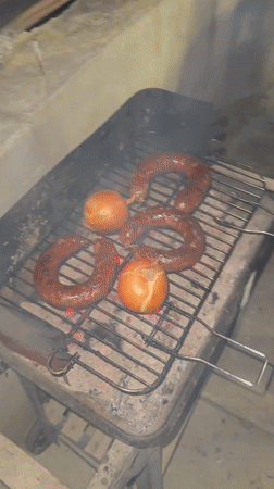 Outdoor grilling scene captured in Dunavtsi, Bulgaria