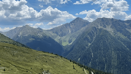 Winding Alpine road through St. Leonhard in Passeier on a clear day
