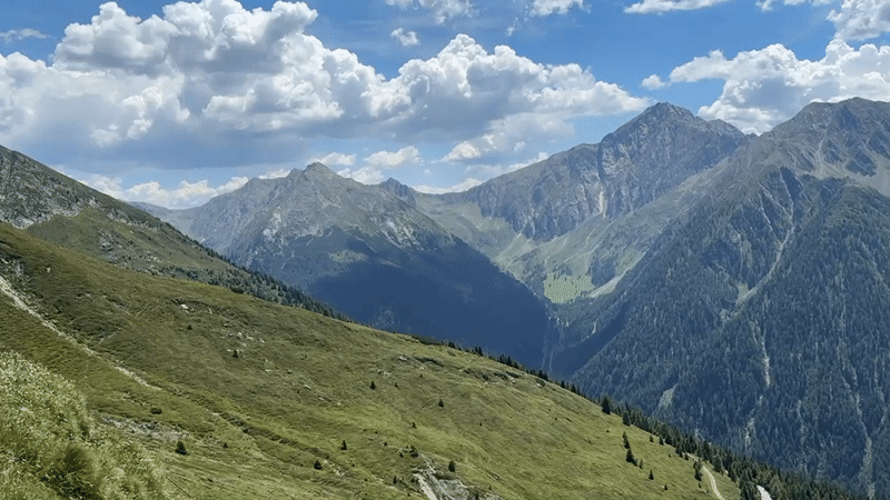 Winding Alpine road through St. Leonhard in Passeier on a clear day