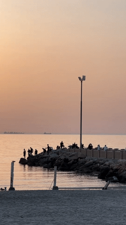 Evening waterfront activity captured in Kiryat Yam, Israel