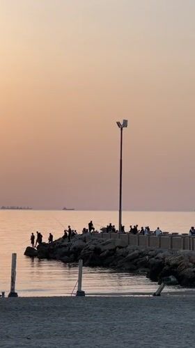 Evening waterfront activity captured in Kiryat Yam, Israel