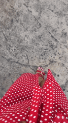Selfie stop in Budva, red polka dots on stone streets