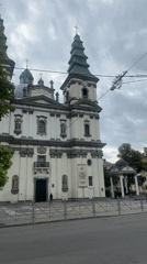 White church with green towers documented in Ternopil