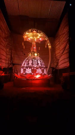 Illuminated Buddhist stupa observed in Panama, Sri Lanka park
