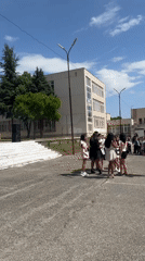 Students release colored smoke bombs at school gathering in Bulgaria