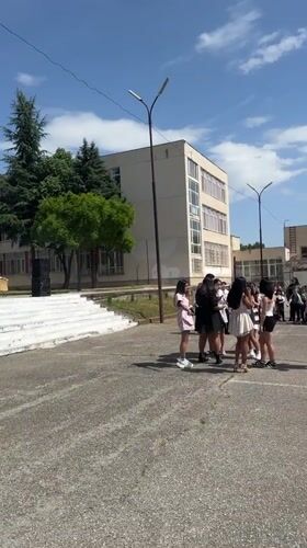 Students release colored smoke bombs at school gathering in Bulgaria