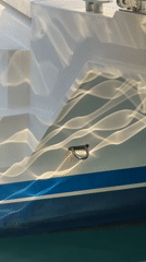 Sunlit boat hull on the water in Fethiye