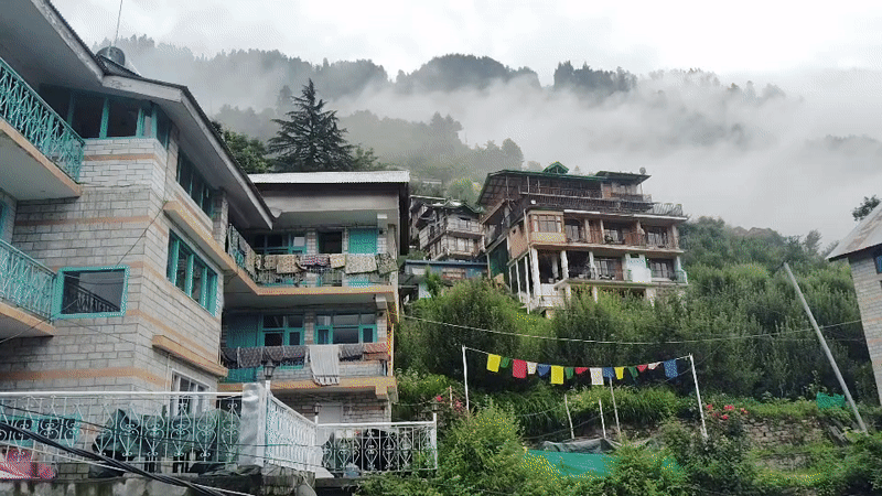 Cloudy afternoon views across Vashisht village and its mountain valley