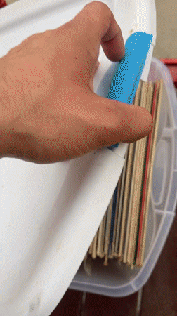 Person browses vinyl record collection in Newburgh