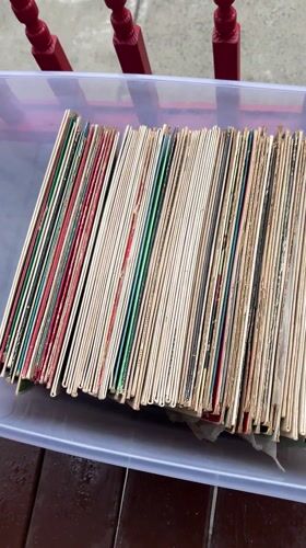 Person browses vinyl record collection in Newburgh