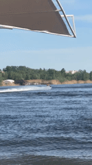 Sunny beach day documented along Volga River in Engels
