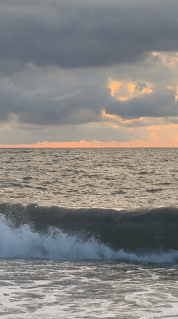 Batumi at sunset: Black Sea waves and a glowing classical facade