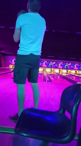 Neon-lit bowling night in Chelles, France