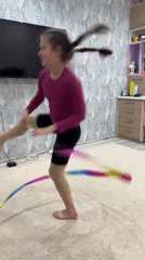 Young gymnast practices with ribbons in Chaikovsky, Russia