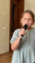 Live vocals and guitar at a local recital in Gulkevichi