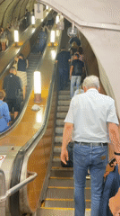 Morning rush on the Moscow Metro escalators and trains