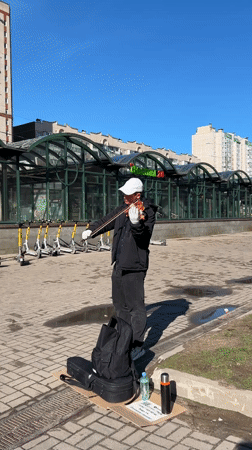 Street violinist performs morning concert in Saint Petersburg
