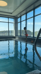 Morning swimming activities captured at Chaikovsky indoor pool facility