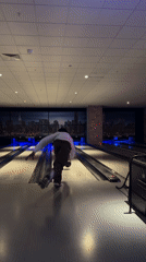 Man bowls at London indoor alley Monday afternoon